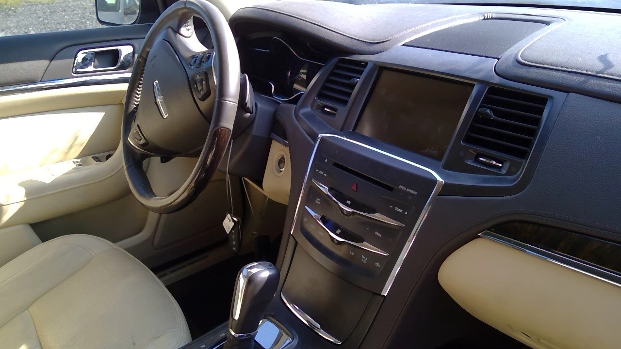 https://f005.backblazeb2.com/file/img-partshotlines-com/Inventory/EX571/Vehicle/21537_12.jpg