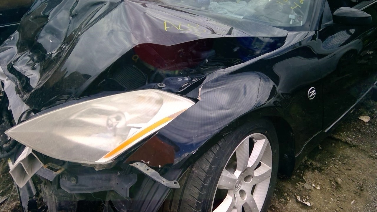 https://f005.backblazeb2.com/file/img-partshotlines-com/Inventory/EX598/Vehicle/32689_04.jpg