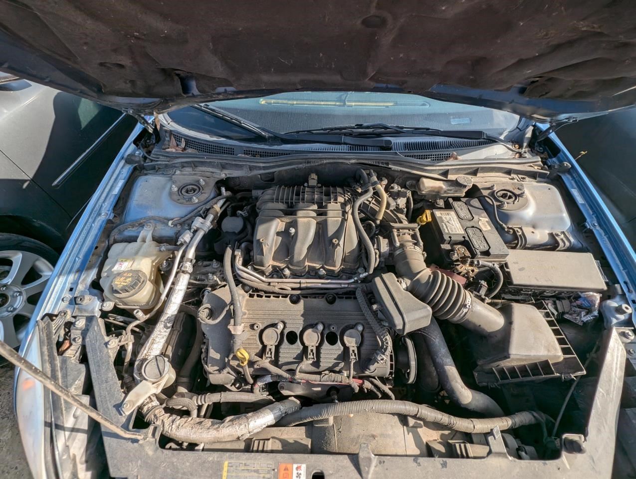 https://f005.backblazeb2.com/file/img-partshotlines-com/Inventory/MA79/Vehicle/76497_09.jpg