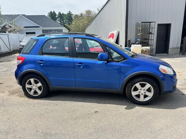 https://f005.backblazeb2.com/file/img-partshotlines-com/Inventory/NE135/Vehicle/20008_03.jpg