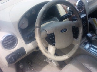 https://f005.backblazeb2.com/file/img-partshotlines-com/Inventory/NE169/Vehicle/2129_11.jpg