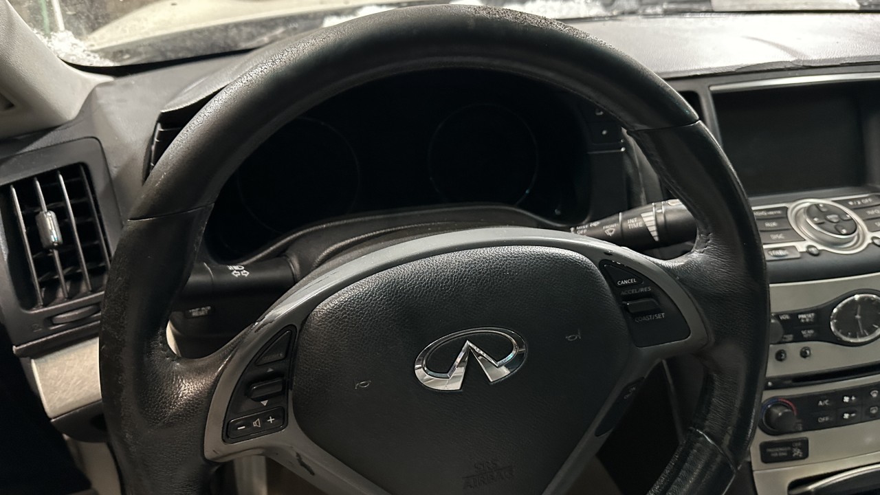 https://f005.backblazeb2.com/file/img-partshotlines-com/Inventory/NE179/Vehicle/64980_07.jpg