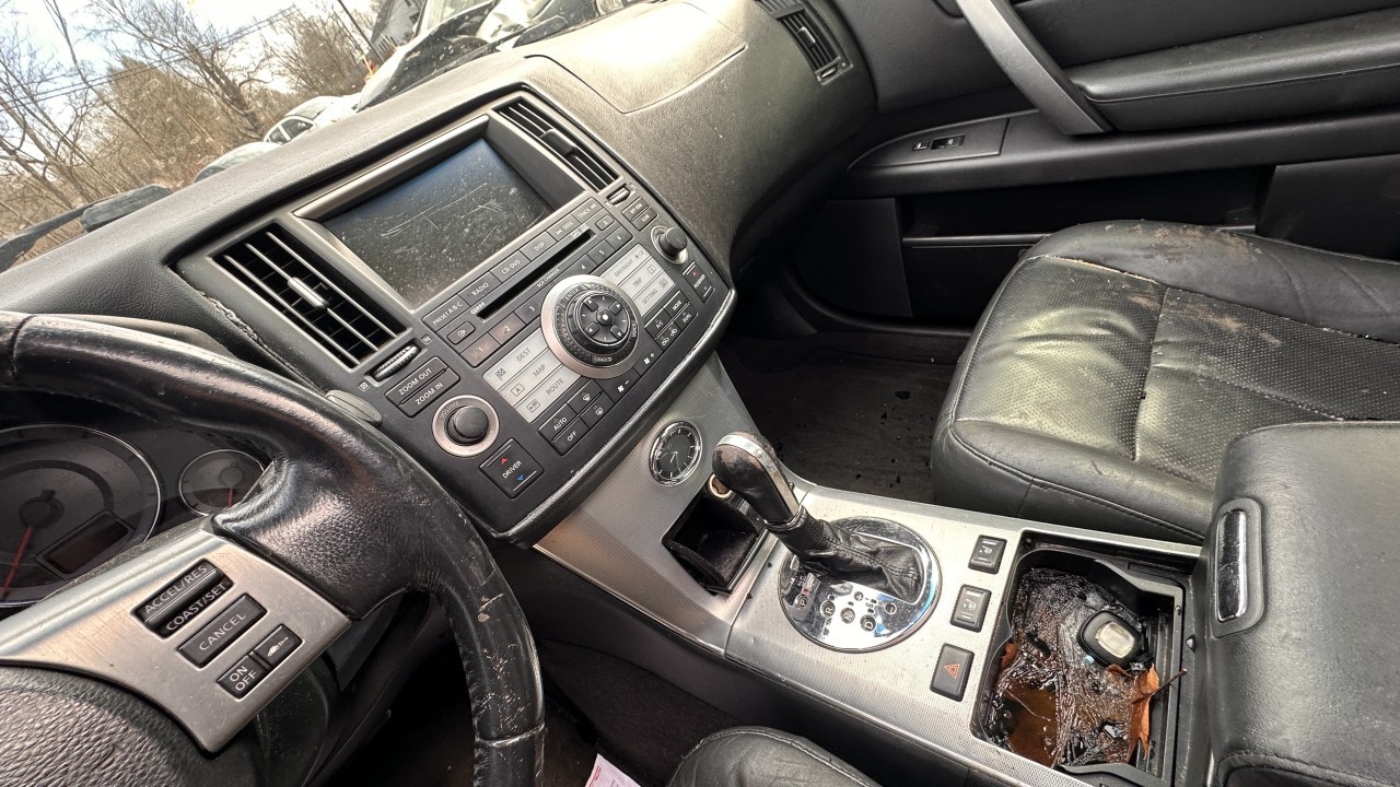 https://f005.backblazeb2.com/file/img-partshotlines-com/Inventory/NE179/Vehicle/66721_06.jpg