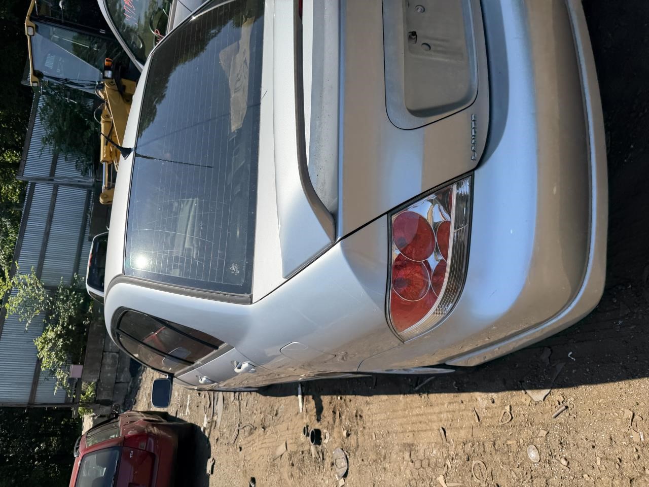 https://f005.backblazeb2.com/file/img-partshotlines-com/Inventory/NE179/Vehicle/69003_07.jpg