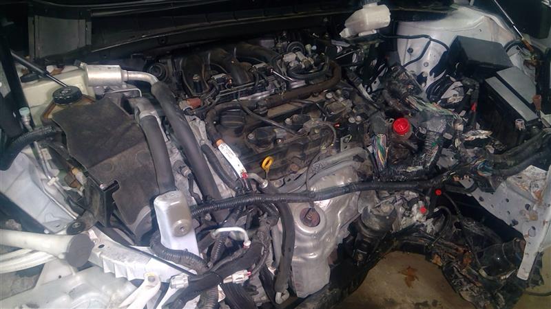 https://f005.backblazeb2.com/file/img-partshotlines-com/Inventory/NE18/Vehicle/17690_03.jpg