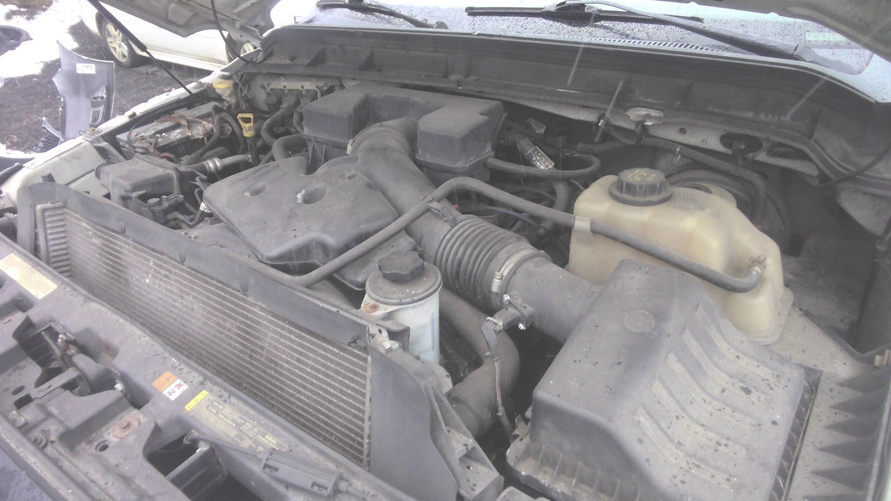https://f005.backblazeb2.com/file/img-partshotlines-com/Inventory/NE188/Vehicle/10386_09.jpg