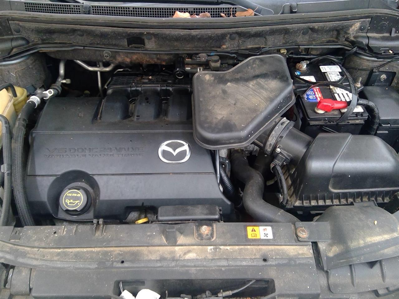 https://f005.backblazeb2.com/file/img-partshotlines-com/Inventory/NE219/Vehicle/472827_09.jpg