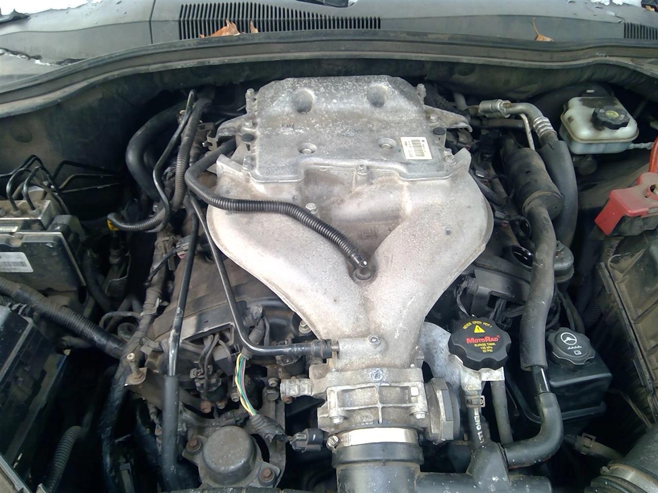 https://f005.backblazeb2.com/file/img-partshotlines-com/Inventory/NE219/Vehicle/473534_08.jpg