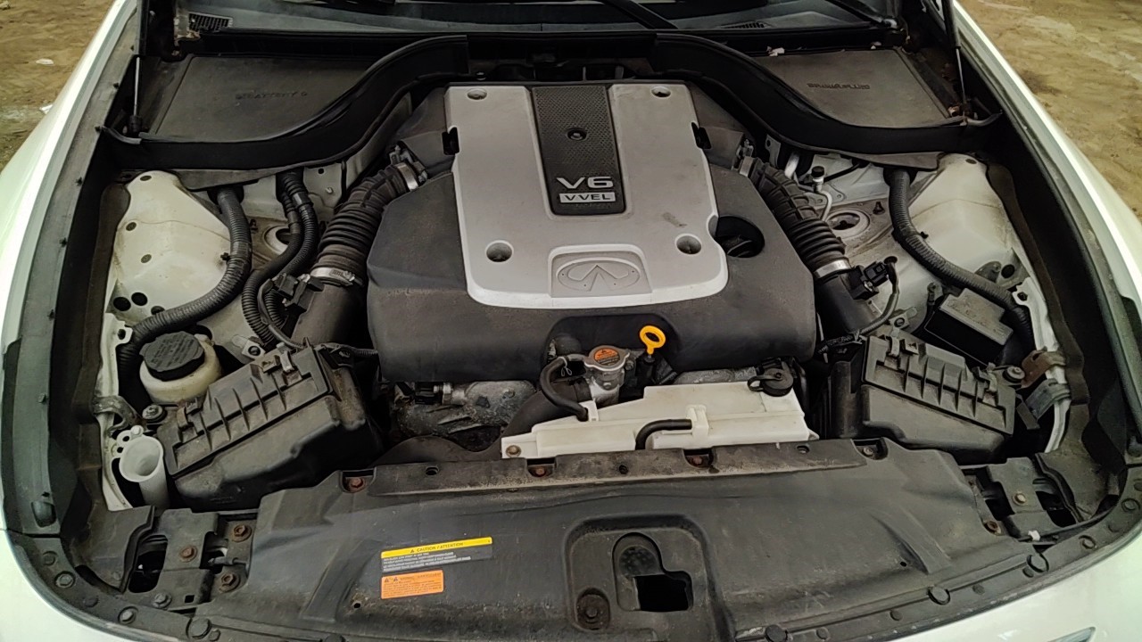 https://f005.backblazeb2.com/file/img-partshotlines-com/Inventory/NE219/Vehicle/483624_09.jpg