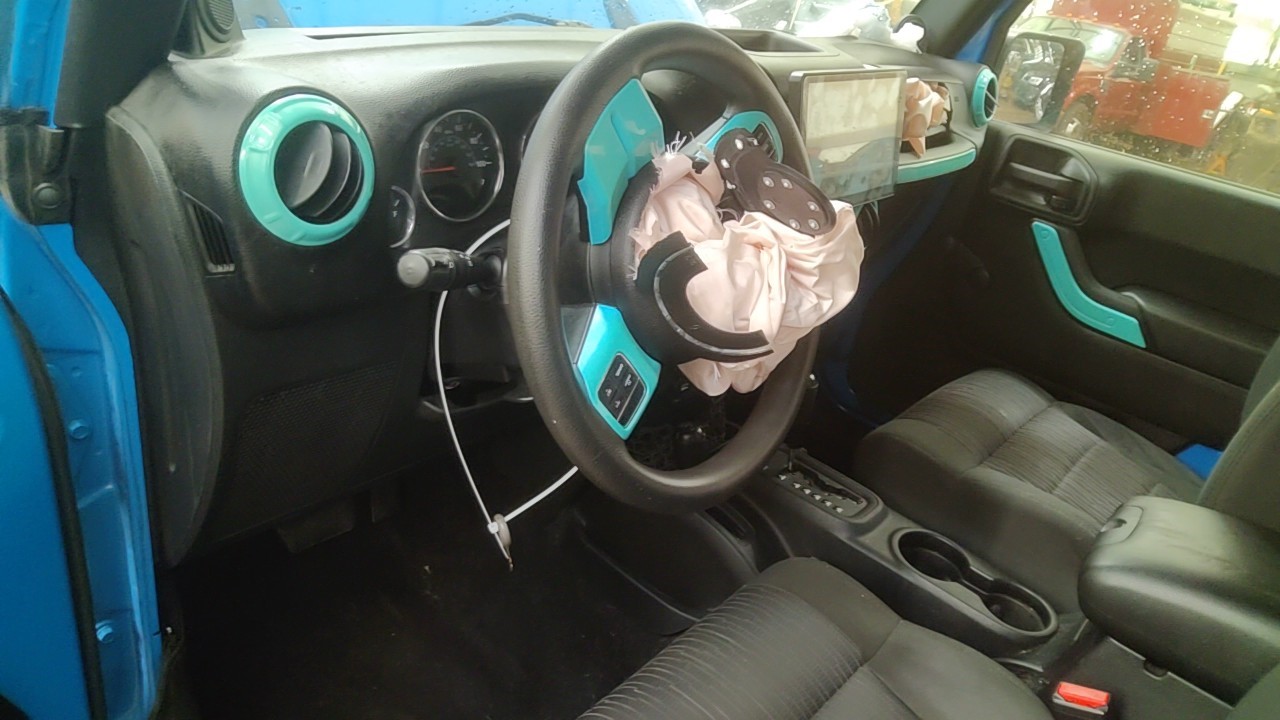 https://f005.backblazeb2.com/file/img-partshotlines-com/Inventory/NE219/Vehicle/489770_12.jpg