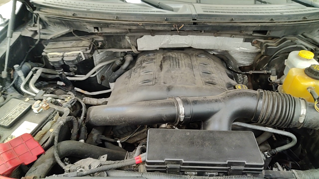 https://f005.backblazeb2.com/file/img-partshotlines-com/Inventory/NE219/Vehicle/490998_09.jpg