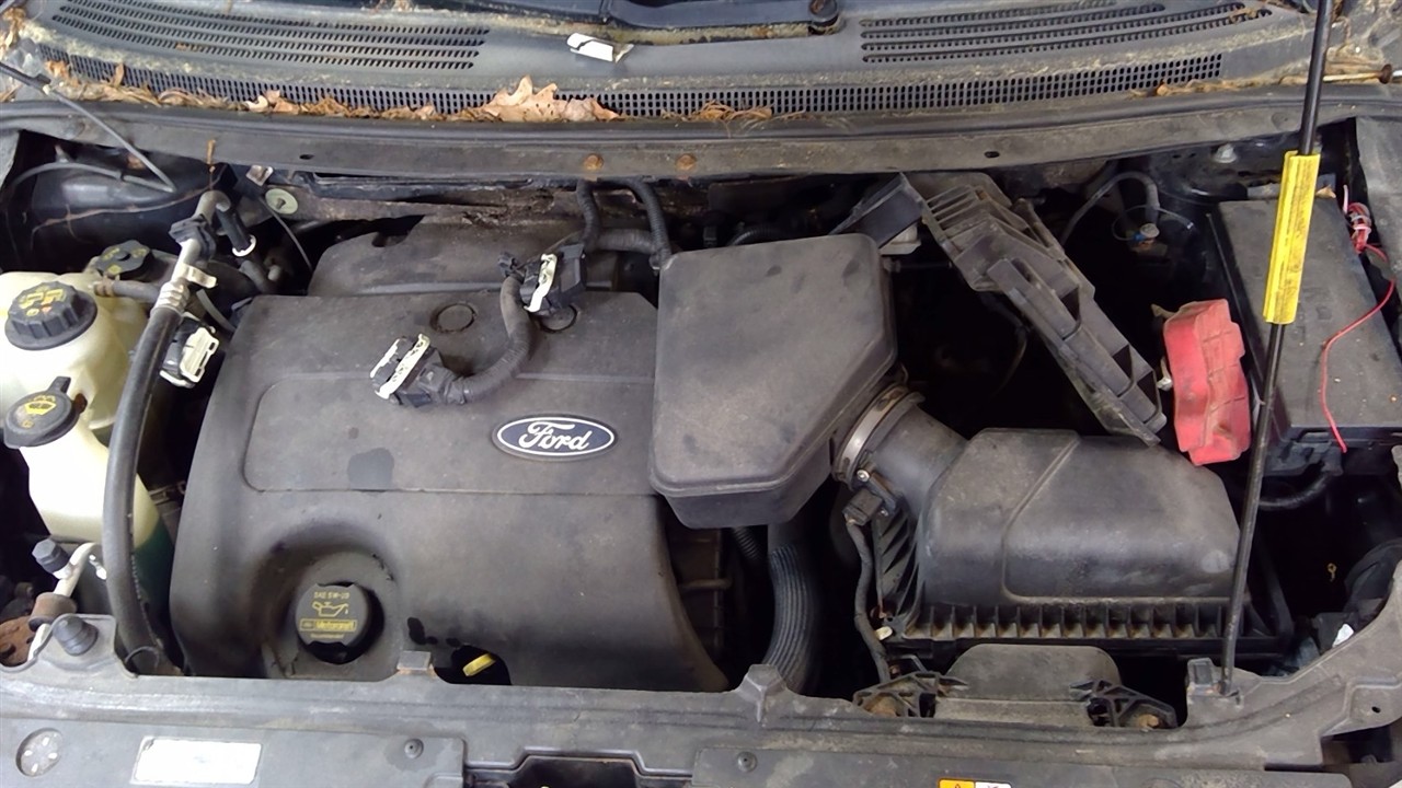 https://f005.backblazeb2.com/file/img-partshotlines-com/Inventory/NE71/Vehicle/14203_10.jpg