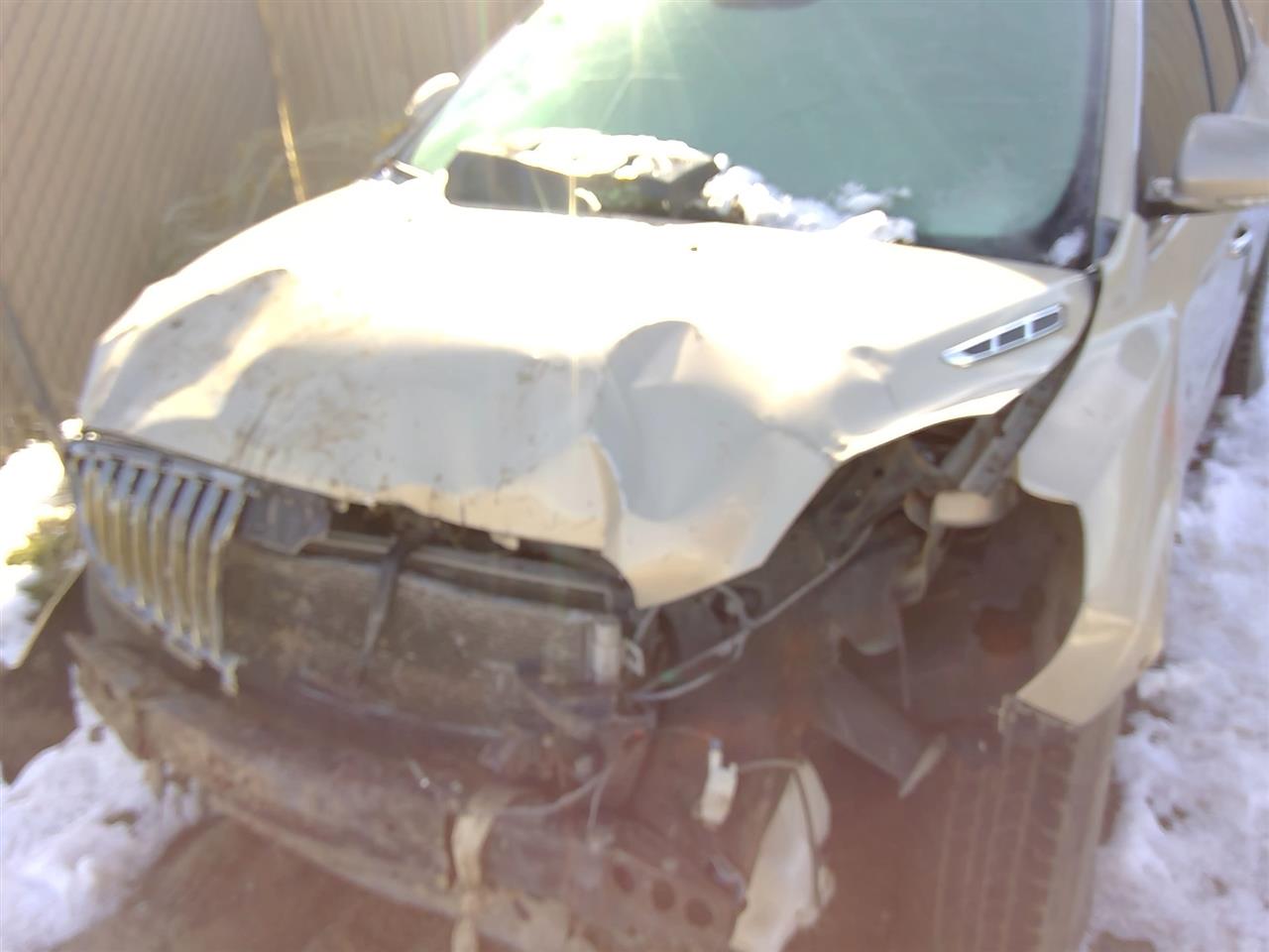 https://f005.backblazeb2.com/file/img-partshotlines-com/Inventory/SW52/Vehicle/20721_09.jpg