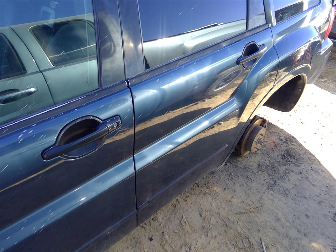 https://f005.backblazeb2.com/file/img-partshotlines-com/Inventory/SW52/Vehicle/20753_11.jpg