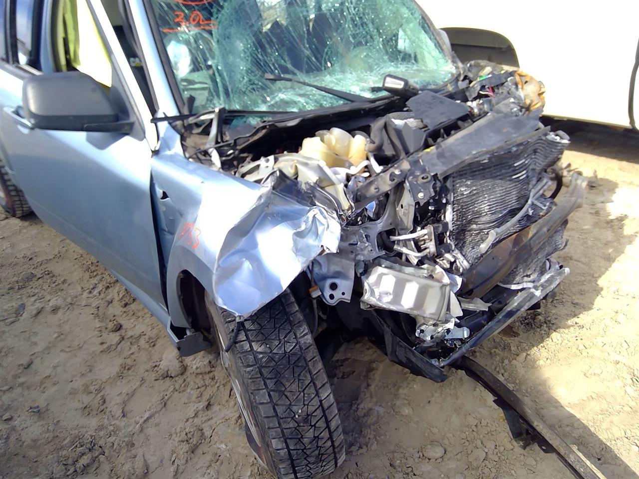https://f005.backblazeb2.com/file/img-partshotlines-com/Inventory/SW52/Vehicle/20794_02.jpg